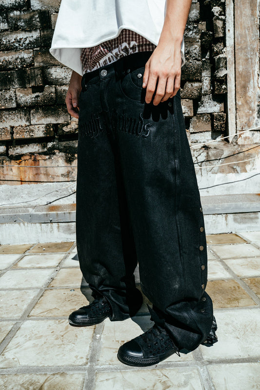 【THOUGHT WE FRIEND】"Lucius" Embroidered Waxed Baggy Denims in Black
