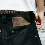 "Lucius" Embroidered Waxed Baggy Denims in Black