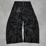 Waxed drawstring pants with side studs