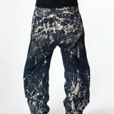 “Relationship“ Printed Splashed Ink Washed Jeans in Blue