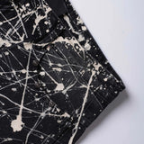 “Relationship“ Printed Splashed Ink Washed Jeans in Black